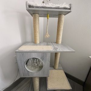 Light grey wooden cat tree.